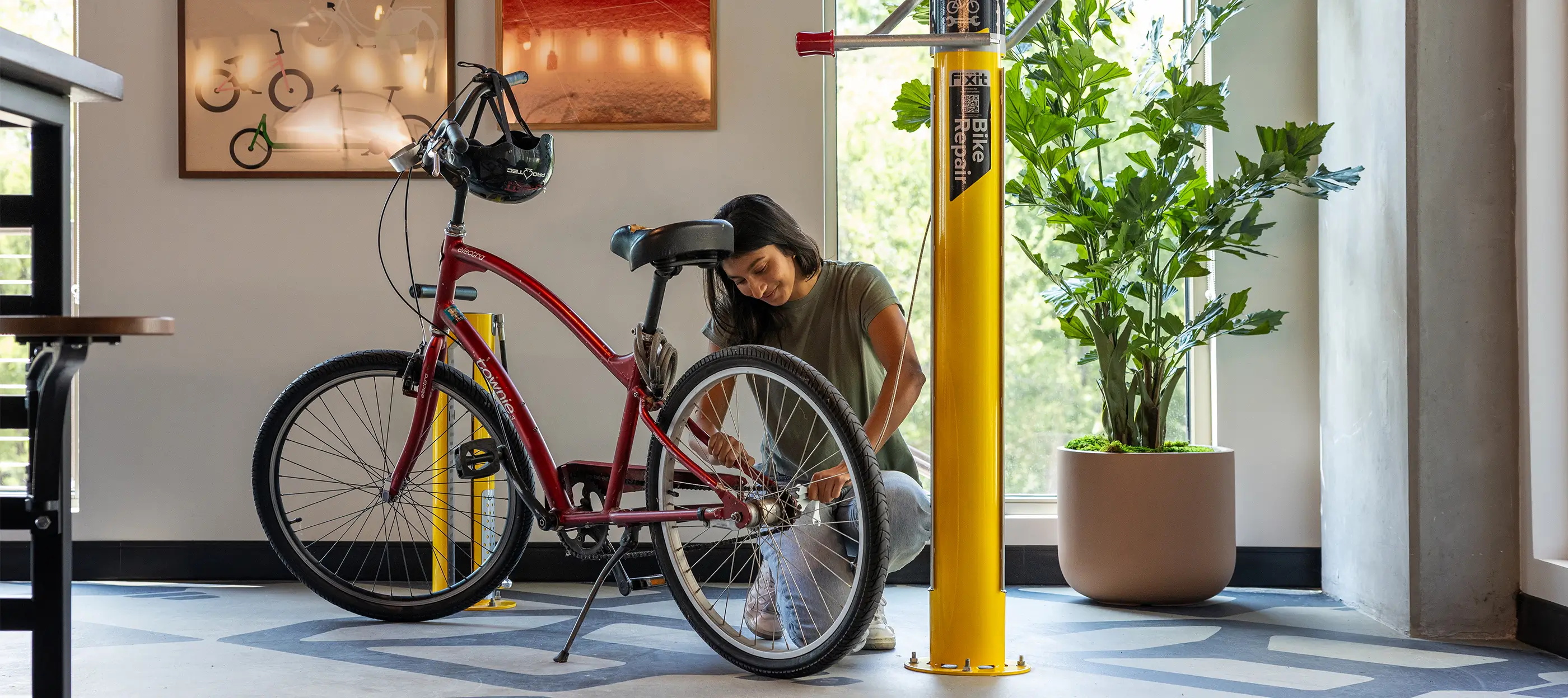 woman working on a bike