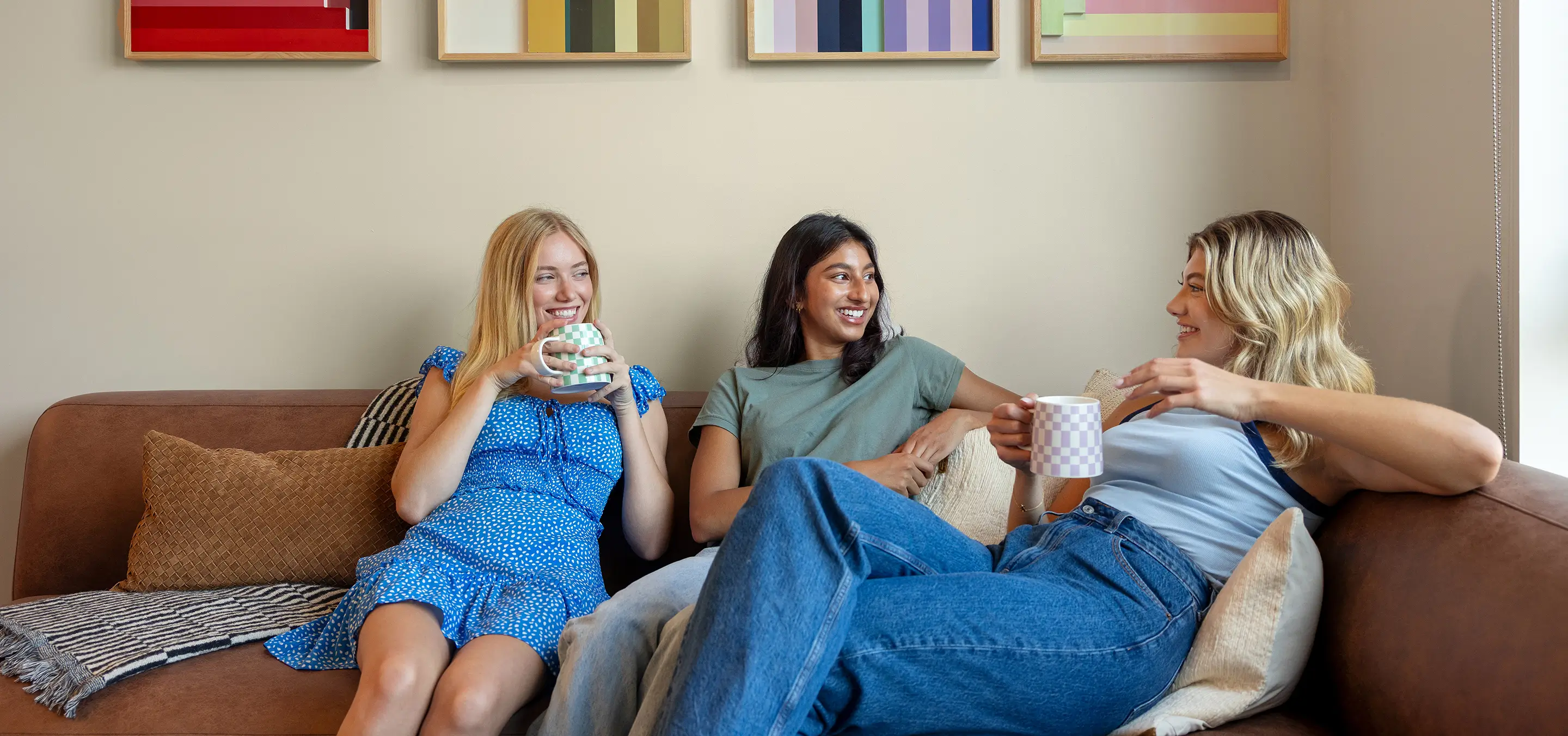 three young women relaxing at home